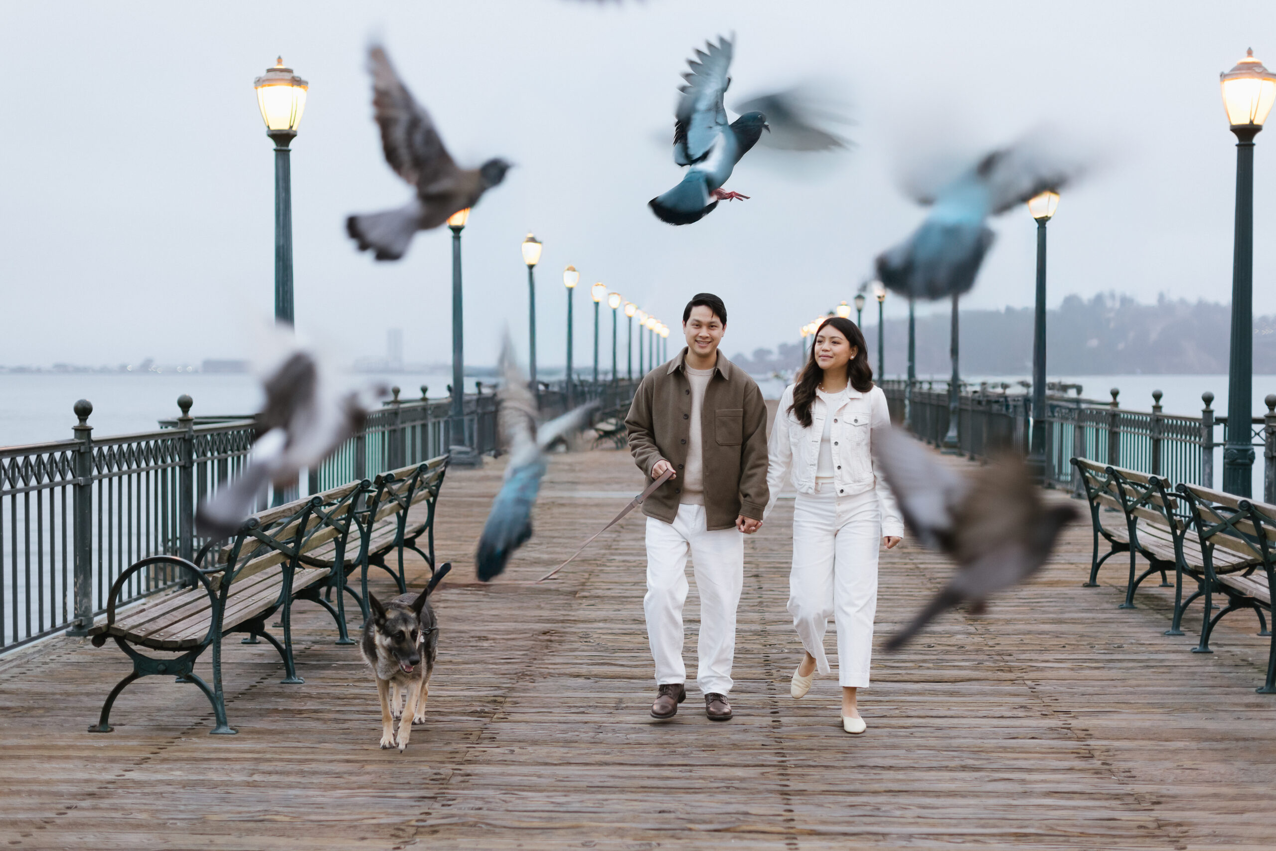 Couple walking on Pier 7 in San Francisco