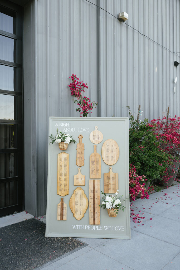 seating chart carved into rustic boards